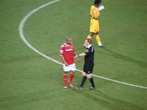 The ref has a word with Agogo