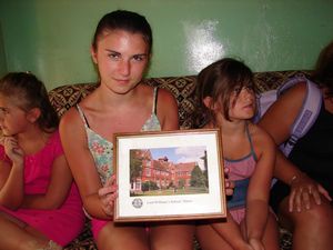 Ellen with a photo of Lord Williams that the school has in it's oiffice